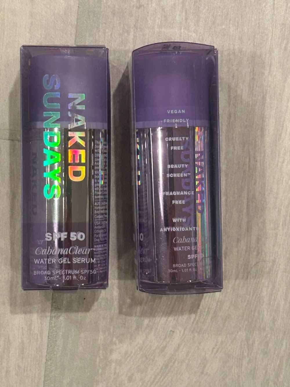 NAKED SUNDAYS SPF 50 Water Gel Serum - Purple Bottle